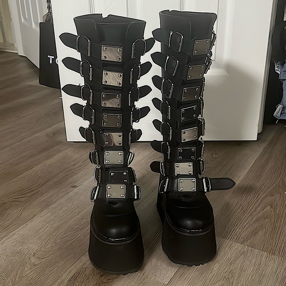 DEMONIA ‘Damned-318’ Black Vegan Leather Platformed Boots